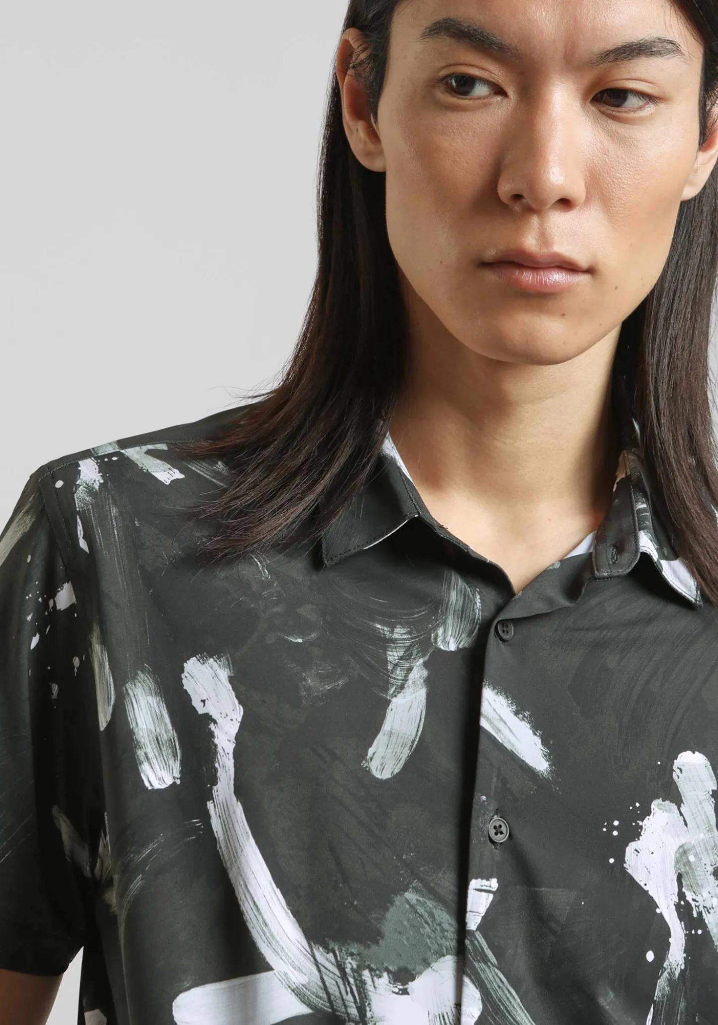Camicia mezza manica in tessuto elastico con fantasia