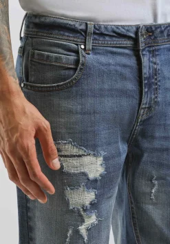 Jeans skinny fit con strappi