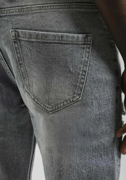 Jeans skinny fit con strappi