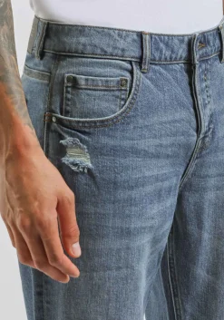 Jeans skinny fit con strappi