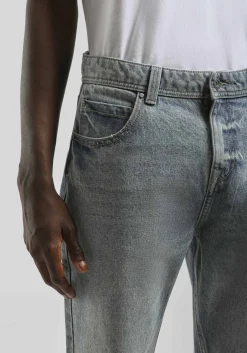 Jeans slim fit con strappi