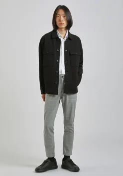 Pantaloni chino con fantasia a quadri