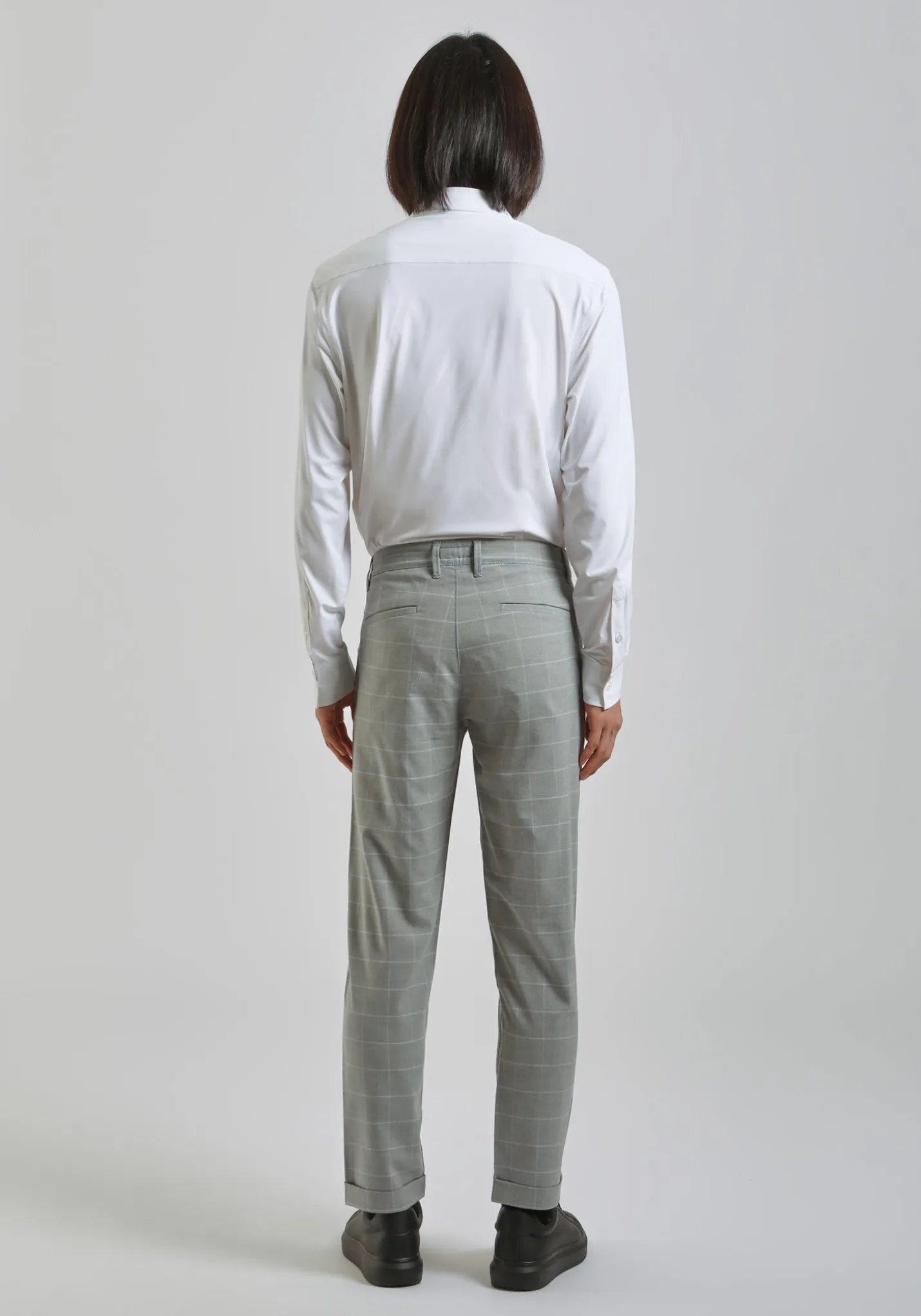 Pantaloni chino con fantasia a quadri