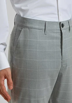 Pantaloni chino con fantasia a quadri