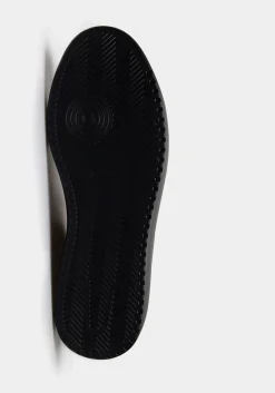 Sneakers effetto pelle