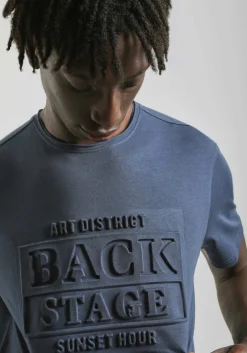 T-shirt con stampa a rilievo