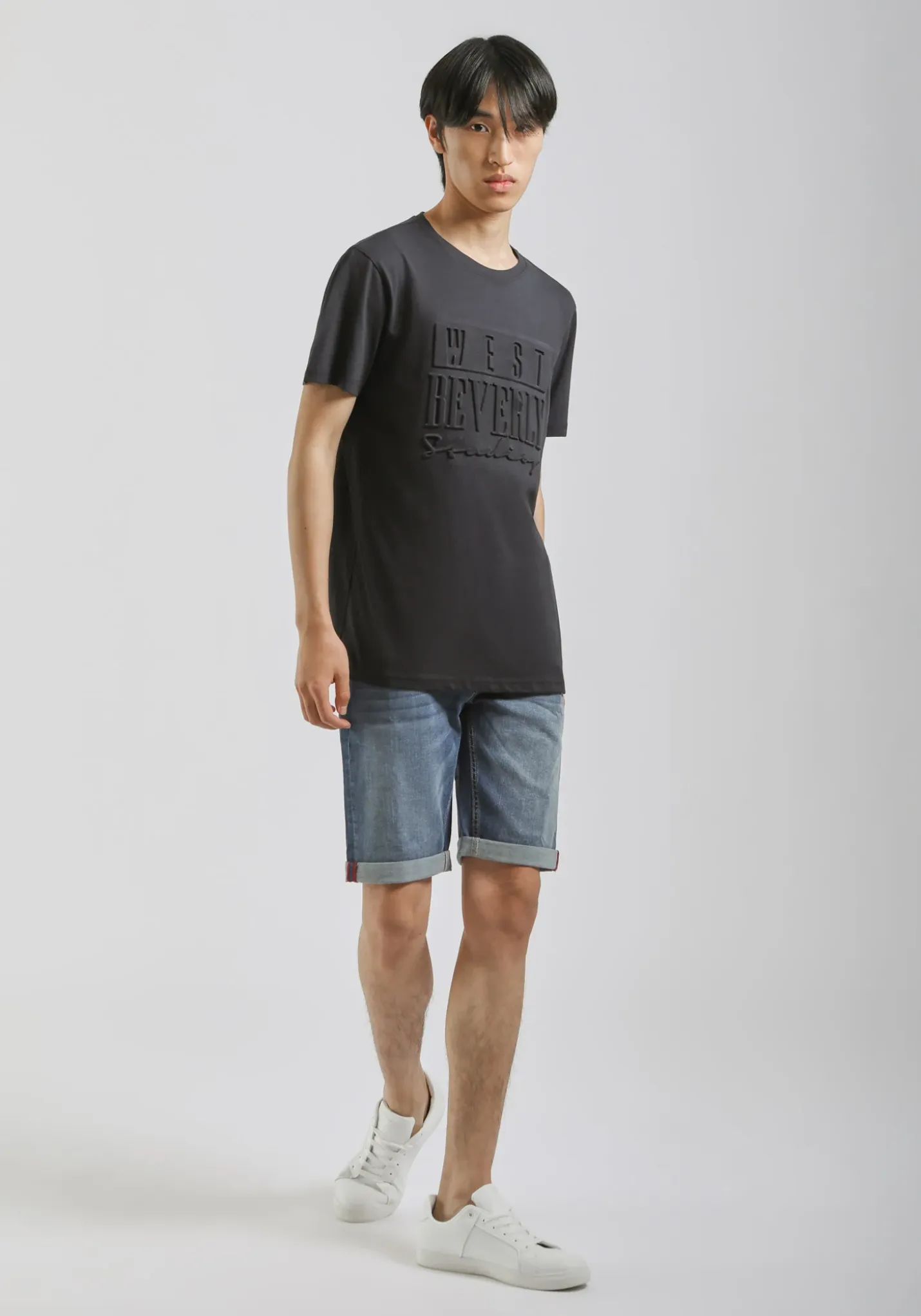 T-shirt con stampa a rilievo